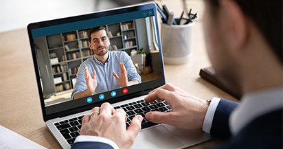 Sales Coach doing virtual meeting with student