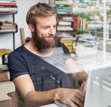 Man on desktop computer.